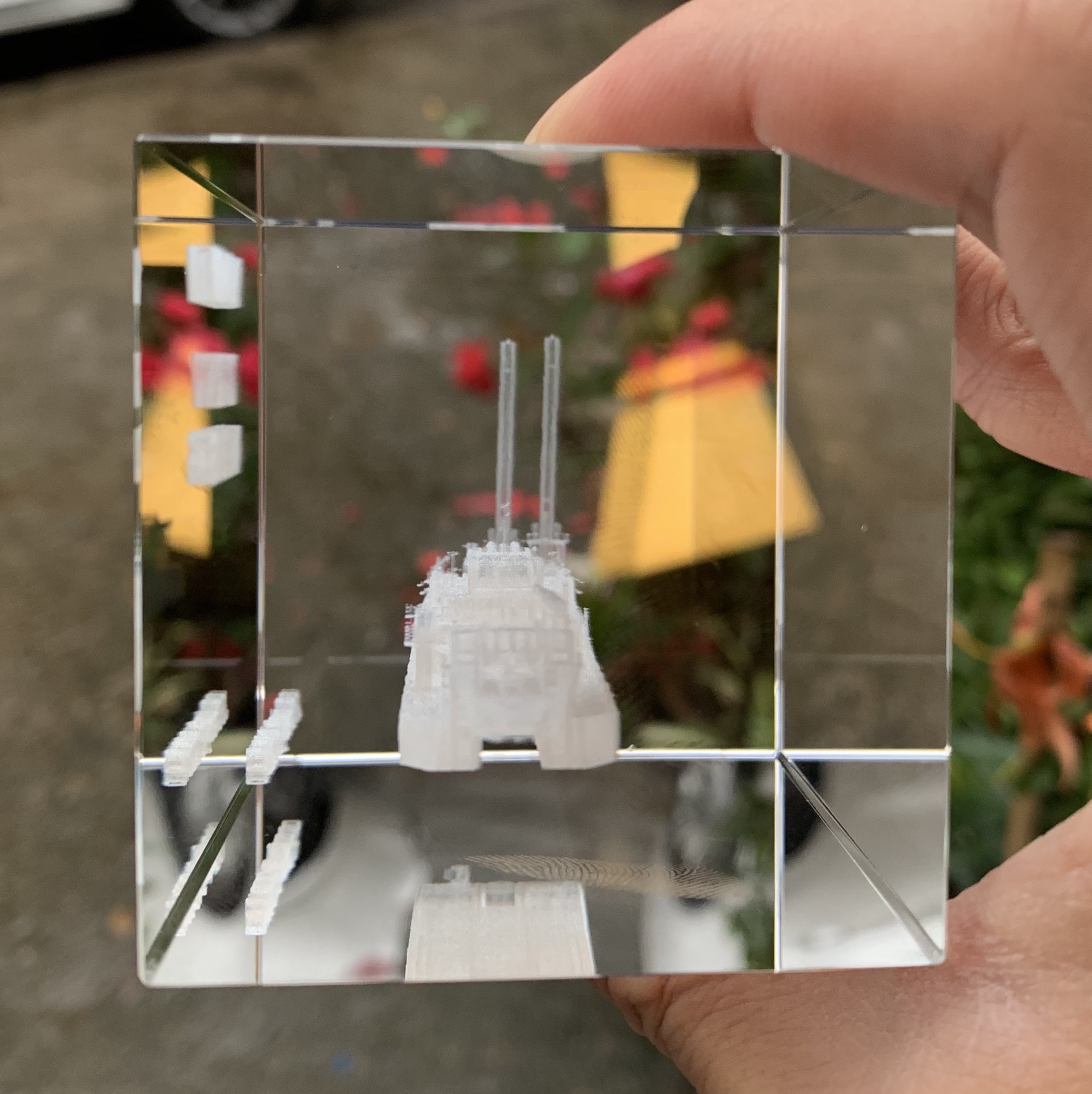 High-precision 3D internal laser etching showing intricate ship deck details