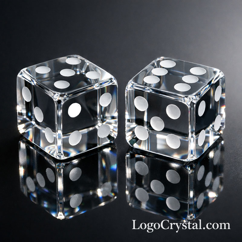 A premium sandblasted K9 crystal dice with frosted surface and a 3D laser-etched "SUCCESS" logo inside.